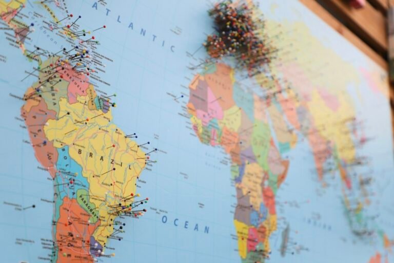 World map with trade route pins